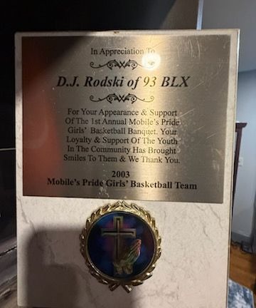 An appreciation plaque presented to D.J. Rodski of 93 BLX by the Mobile’s Pride Girls’ Basketball Team in 2003